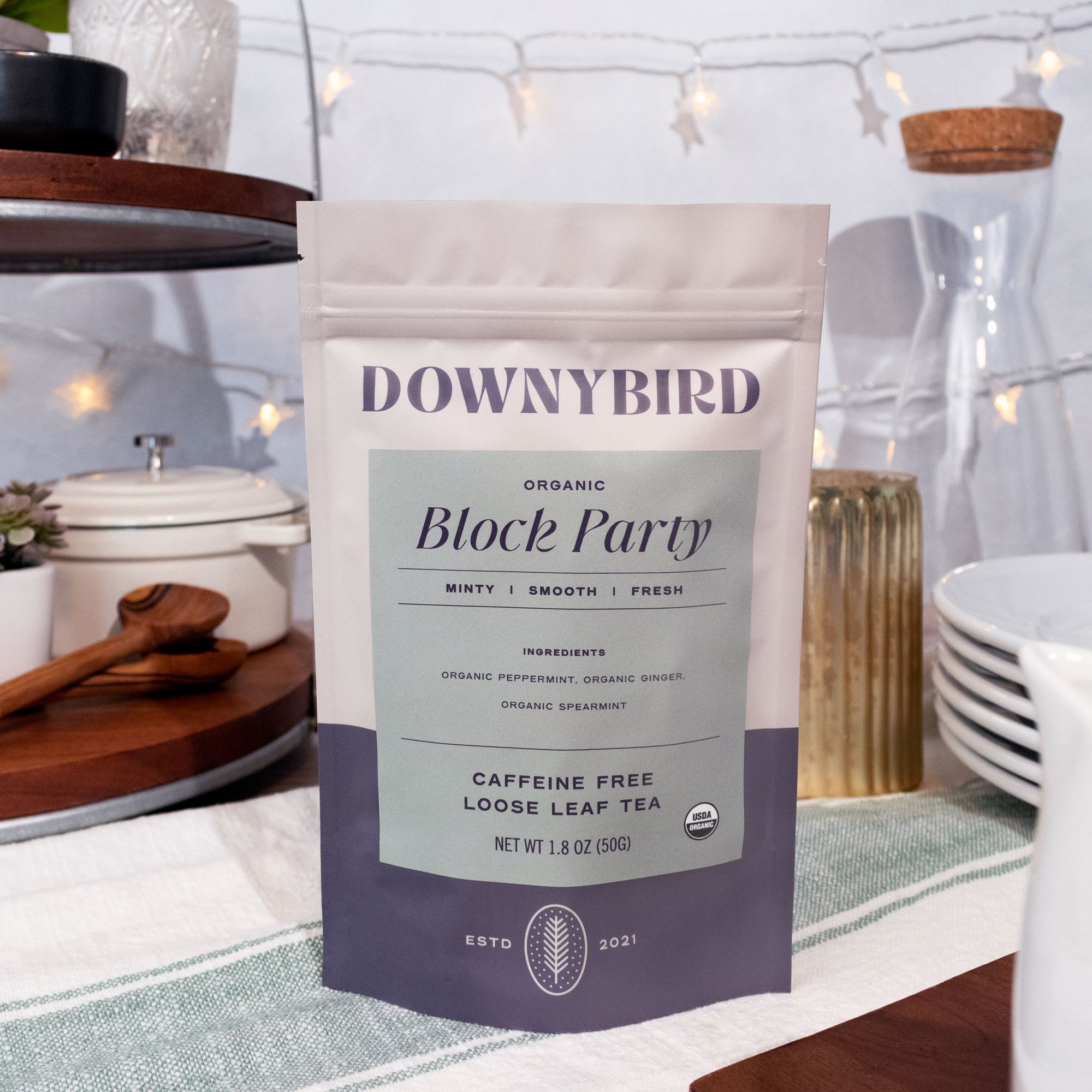 Downybird Block Party Blend Organic Peppermint Loose Leaf Tea Pouch on Outdoor Table